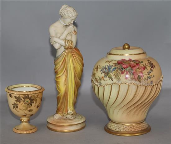 A Worcester classical figurine, blush pot and cover and small vase